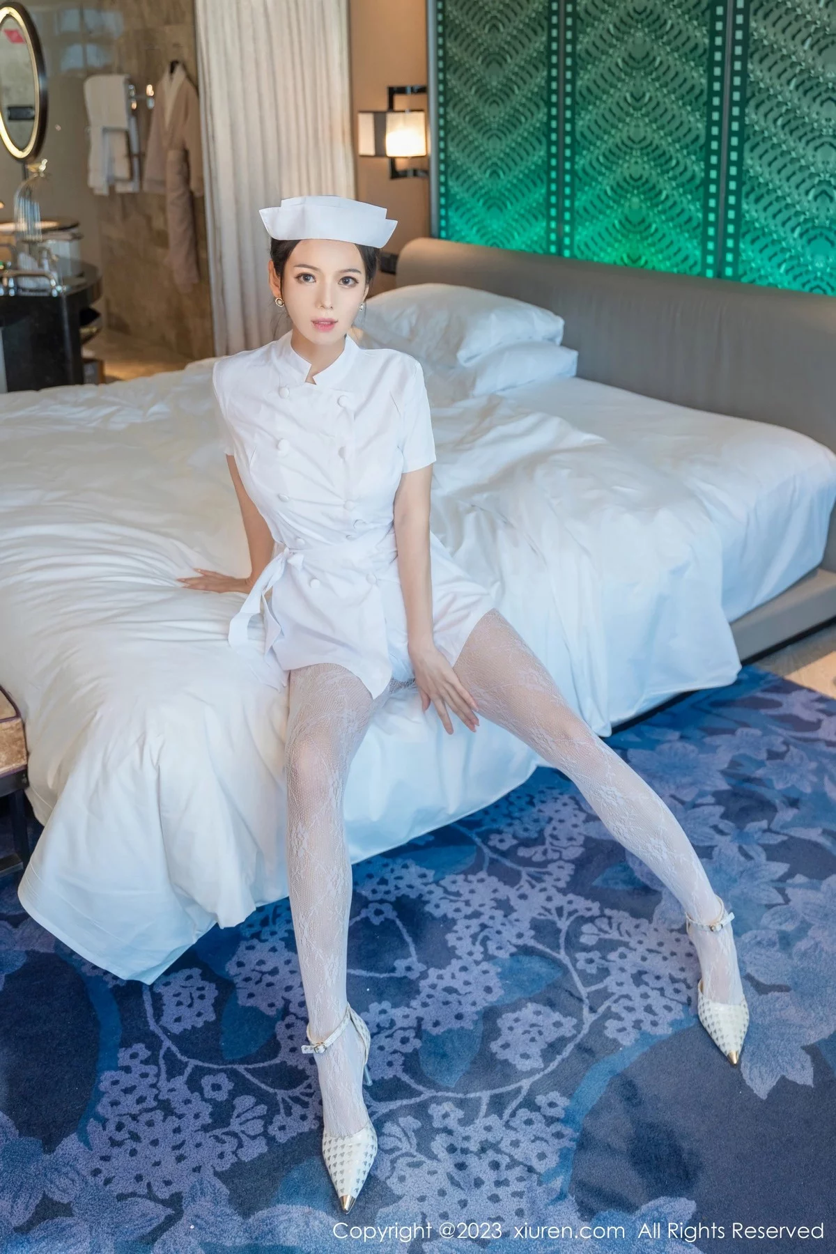Xgyw.Org_XiuRen第6618期_模特大美妞儿性感白色护士装半脱露白色内衣秀完美身材诱惑写真62P